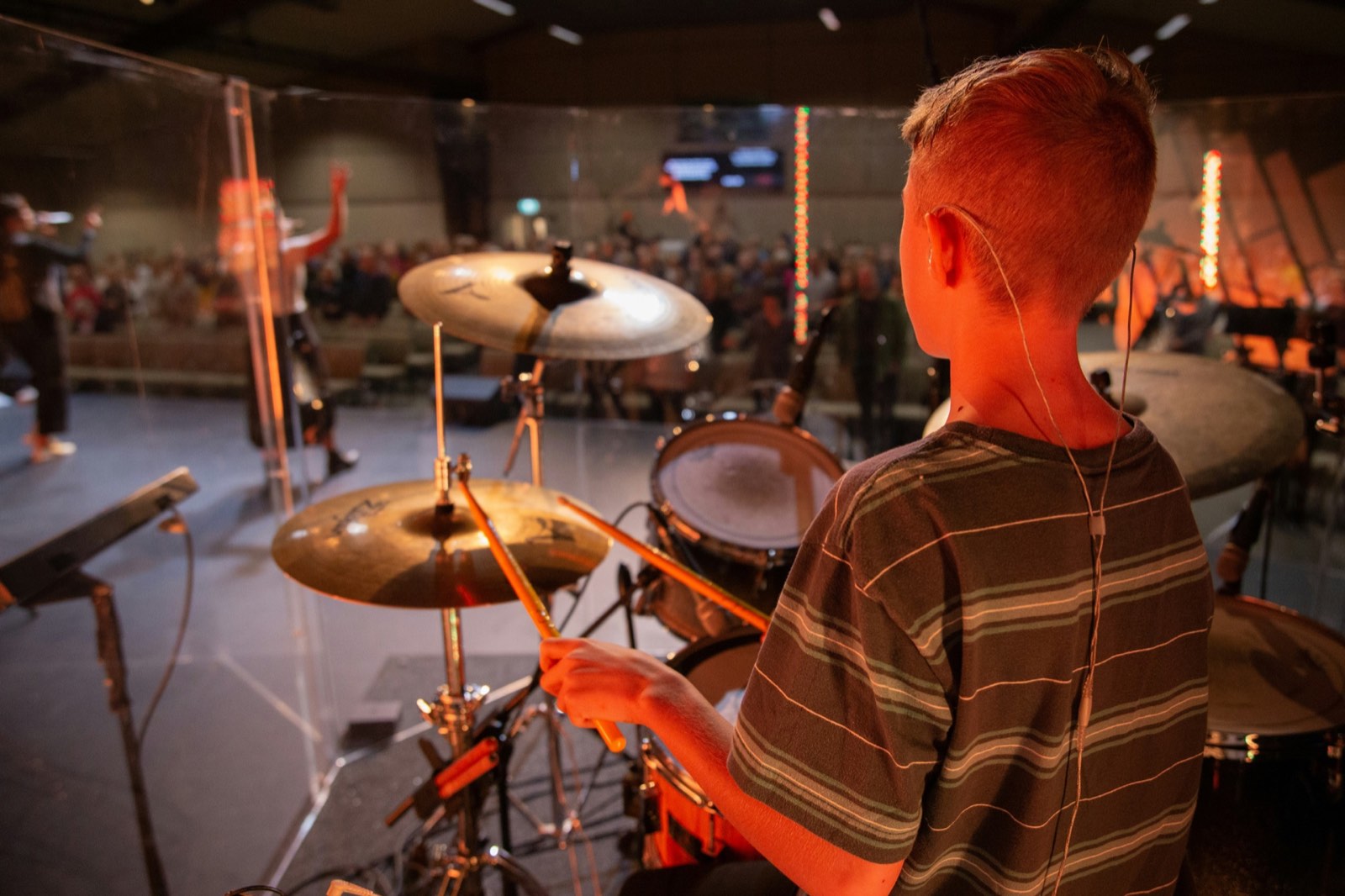 A young drummer practicing in a Twelve Tone Lab class