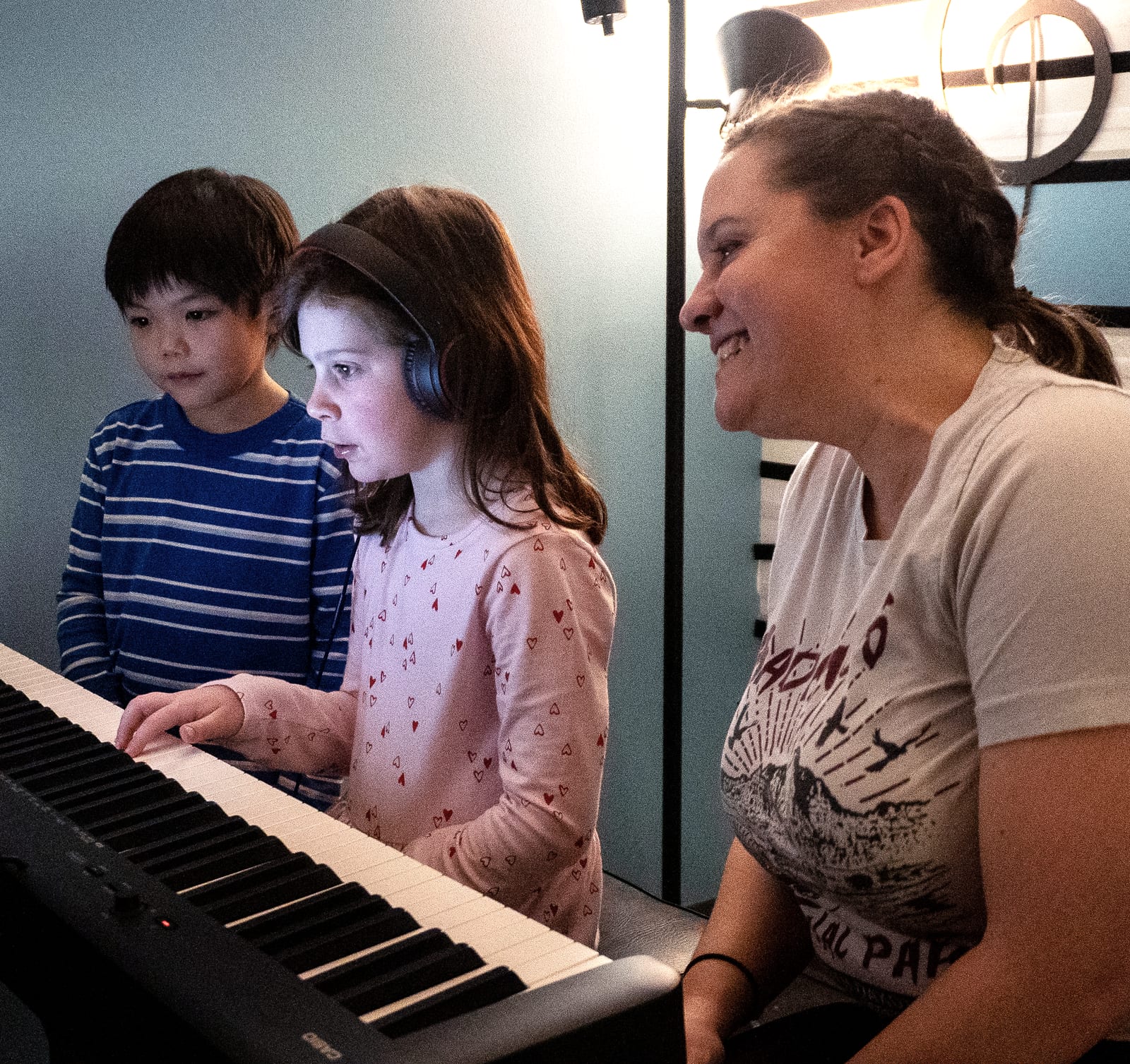A Twelve Tone instructor working one-on-one with a student at the Glenview studio